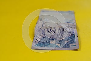 The banknote represents one Malaysian Ringgit.