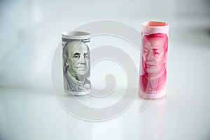 banknote roll, dollar roll and yuan roll. economy chess competition concept.money roll for playing chess.