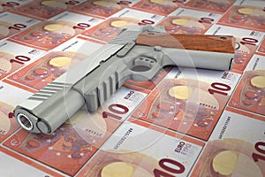 Banknotes 10 euros gun trafficking dirty money full frame concept