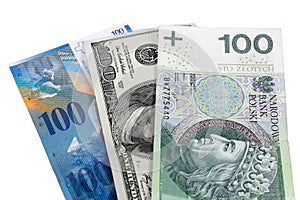 Banknotes of 100 dollars, polish zloty and swiss franc