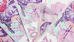 Banknotes of 200 hryvnia. National currency of Ukraine. Cash paper money close up background