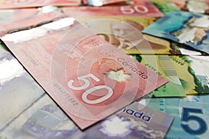 Banknotes of Canadian currency: Dollar. Bills spread and variation of amounts