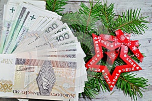 Banknotes on Christmas gifts - Christmas shopping