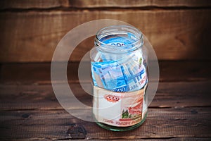 Banknotes in a glass jar, Russian currency