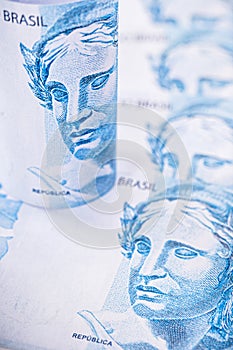 Banknotes of 100 reais from brazil, concept of brazilian economy photo