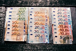 Banknotes on a stone background. Euro money bank notes of different value. European currency - Euro.