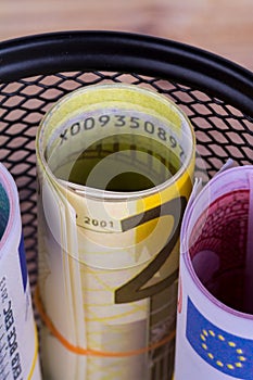 Bankroll Cash Euro Banknotes in Garbage Basket