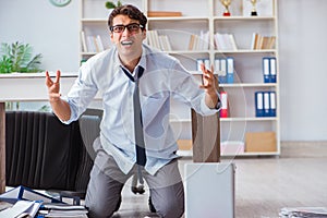 The bankrupt businessman angry in the office floor