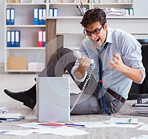 Bankrupt businessman angry in the office floor