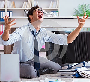 Bankrupt businessman angry in the office floor