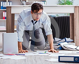 Bankrupt businessman angry in the office floor