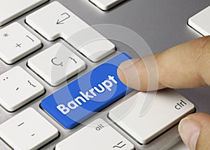 Bankrupt - Inscription on Blue Keyboard Key