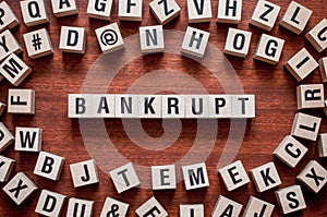 BANKRUPT word concept on cubes