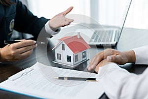 Banks approve loans to buy homes. Real estate agents explain the document for customers who come to contact to buy a house, buy or