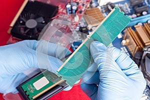 Banks of memory in hands before inserting to PC mainboard