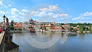 On the banks of the Vltava are the palaces, temples and buildings of the city of Prague. On the river ships take tourists for a ri