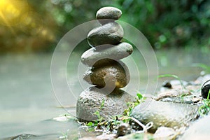 Banlance stone with spa on nature blur background photo