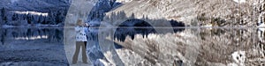 Banner 4x1 with a girl taking pictures on a smartphone Bohinj Lake with a mirrored luggage of water, surrounded by mountains