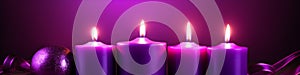 banner of Advent - Four Purple Candles With Mystery Lights.