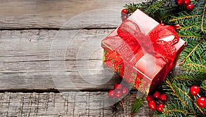 Banner with Christmas gift and decorations on old wood background