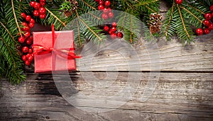 Banner with Christmas gift and decorations on old wood background