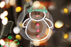 Banner for Christmas and New Year gingerbread. Christmas trees, toys, snowmen, garlands on a background of brown silk