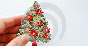 Banner with christmas tree applique with space for text. Christmas tree made of fabric  on white background