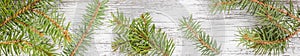 banner of Christmas wooden background with fir tree. Top view copy space