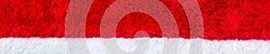 Banner of Close up red and white Santa Claus hat texture to backround