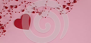 banner with concept of minimalism valentine's day. red heart on pastel pink background with red beads with hearts.flat