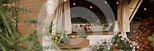 Banner cozy garden window with flowers and lights