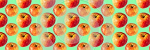 Banner-creative background of red apple. Abstract background. Isolated ripe Apples on green background not seamless pattern