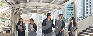 Banner Crowd business people walking teamwork meeting in modern city life. Panorama Crowd worker group of people busy life with