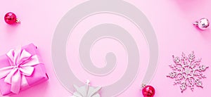 Banner Decorative background Christmas composition Flat lay box gift ribbon bow snowflake cocktail pink.