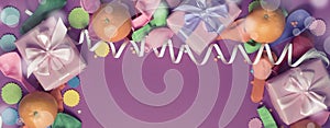 Banner Decorative composition Three boxes with gifts Satin ribbon Bow Oranges Confetti Serpentine birthday party. photo