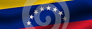 Banner with the flag of Venezuela. Fabric texture of the flag of Venezuela