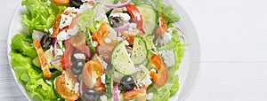 Banner of fresh vegetable Greek salad, top view