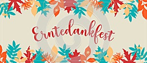 Banner with german text Erntedankfest, translation of Thanksgiving with coloring stamp leaves.