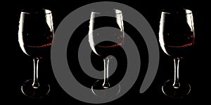 Banner glasses with red wine on black background vinotheque, copy space