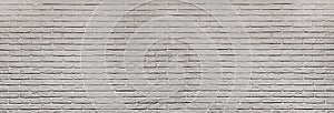 banner grey textured brick wall. gray background photo