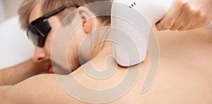Banner hair removal cosmetology procedure from men back laser epilation studio
