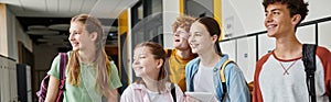 banner, happy teenage schoolkids looking away