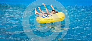 Banner with happy teenager boy in amusement park