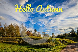 Banner hello autumn. New month. Greeting card. Golden autumn. Autumn in the park. The text in the photo. Trees in the autumn park