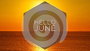 Banner hello june. Text on the photo. Text hello June. New month. New season. Summer month. Text on sunset photo