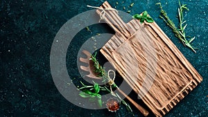 Banner of homemade cooking recipes. Kitchen old wooden board, spices and herbs, free space for text.