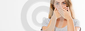 Banner image Shhh sign. Young woman showing shh gesture to keep a silent. Girl in t shirt keep a secret. Quiet place and silence