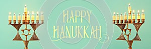 Banner of jewish holiday Hanukkah background with menorah & x28;traditional candelabra& x29; and burning candles.