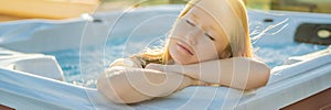 BANNER, LONG FORMAT Portrait of young carefree happy smiling woman relaxing at hot tub during enjoying happy traveling