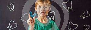 BANNER, LONG FORMAT Six-year old boy shows myofunctional trainer. Helps equalize the growing teeth and correct bite